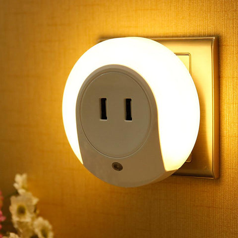 Image of Intelligent sensor LED night light with 2 phone chargers