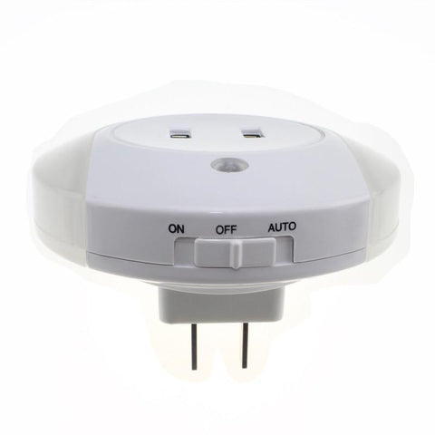 Image of Intelligent sensor LED night light with 2 phone chargers